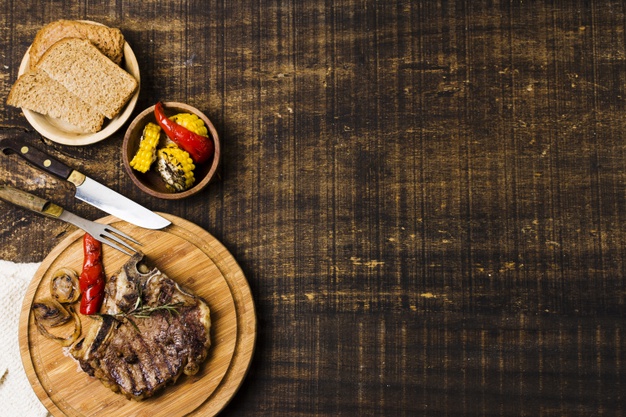 dinner-with-beefsteak-rustic-dishes_23-2148167639